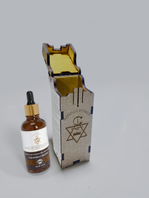 Mini Bottle – Organic Moroccan Argan Oil 30ml | Amigos Power Small amber dropper bottle of Moroccan Argan Oil from Amigos Power with gold cap, placed on a light background.