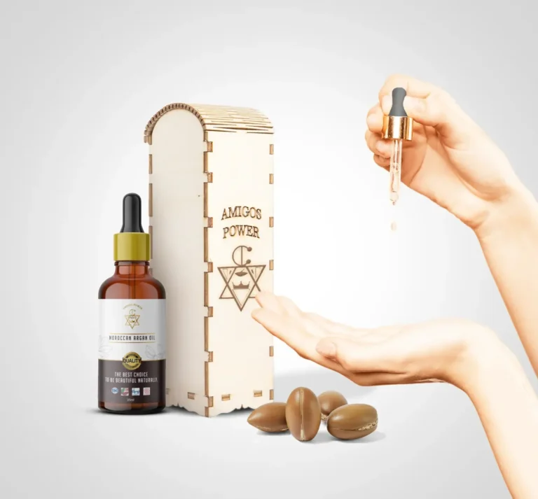 "Glass dropper bottle of Moroccan argan oil used for glowing, healthy skin care"
